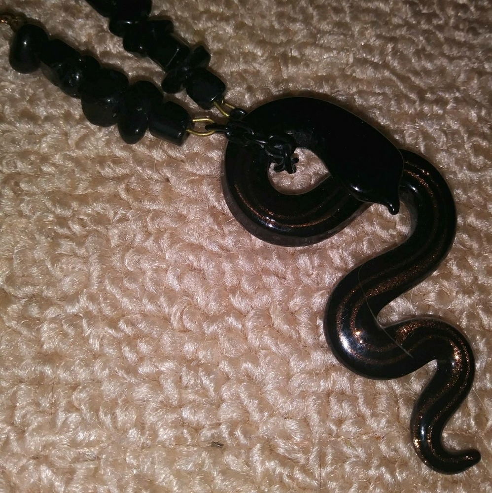 Hand-made glass snake pendant